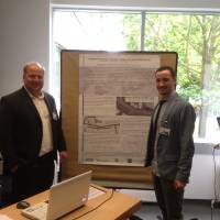 Our poster in Berlin with Andrea Marella (right) and Eng. Bonfanti (left)